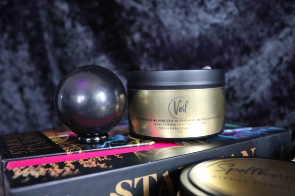 Veil is a protection and boundary ritual candle infused with obsidian and clear quartz. Ground your energy, reclaim your space, and stand sovereign.
